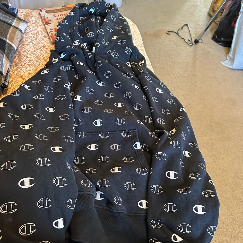Black Champion hoodie with white Champion logos all over it xl
